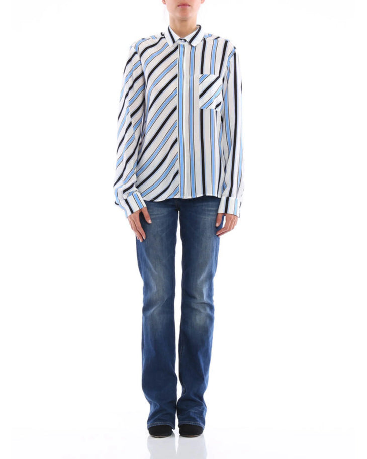 Striped silk shirt with blue, black and white diagonal stripes paired with dark blue jeans — M.S.G.M | Endless UAE