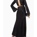 Black satin co-ord set with open back detail and flared sleeves, worn with heeled sandals — Significant Other | Endless UAE