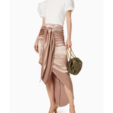 Rose gold velour wrap skirt with ruched detailing styled with white top — No Pise La Grama | Endless UAE