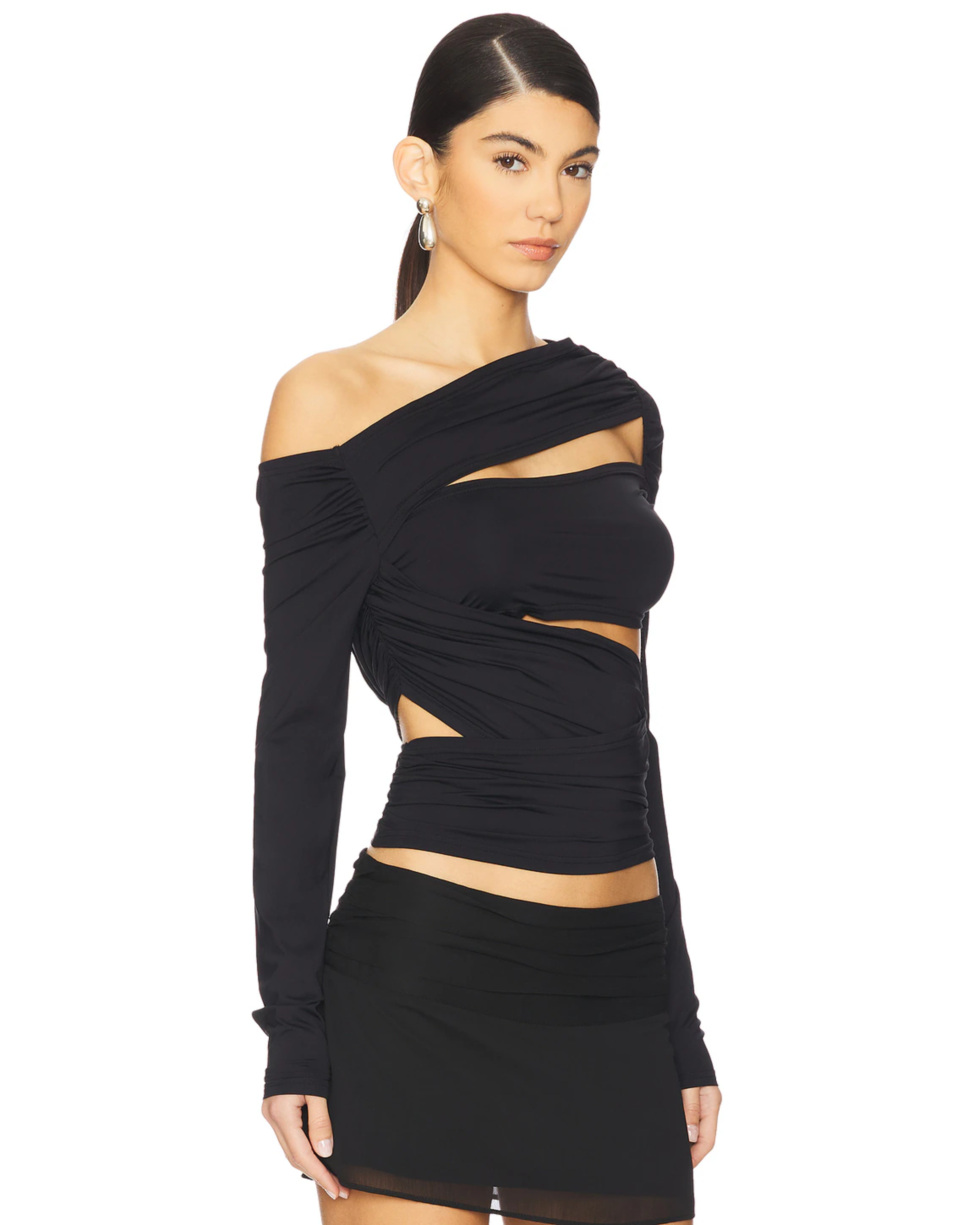 Black off-shoulder long sleeve top with asymmetric cutout draping and wrapped design — Lioness | Endless UAE