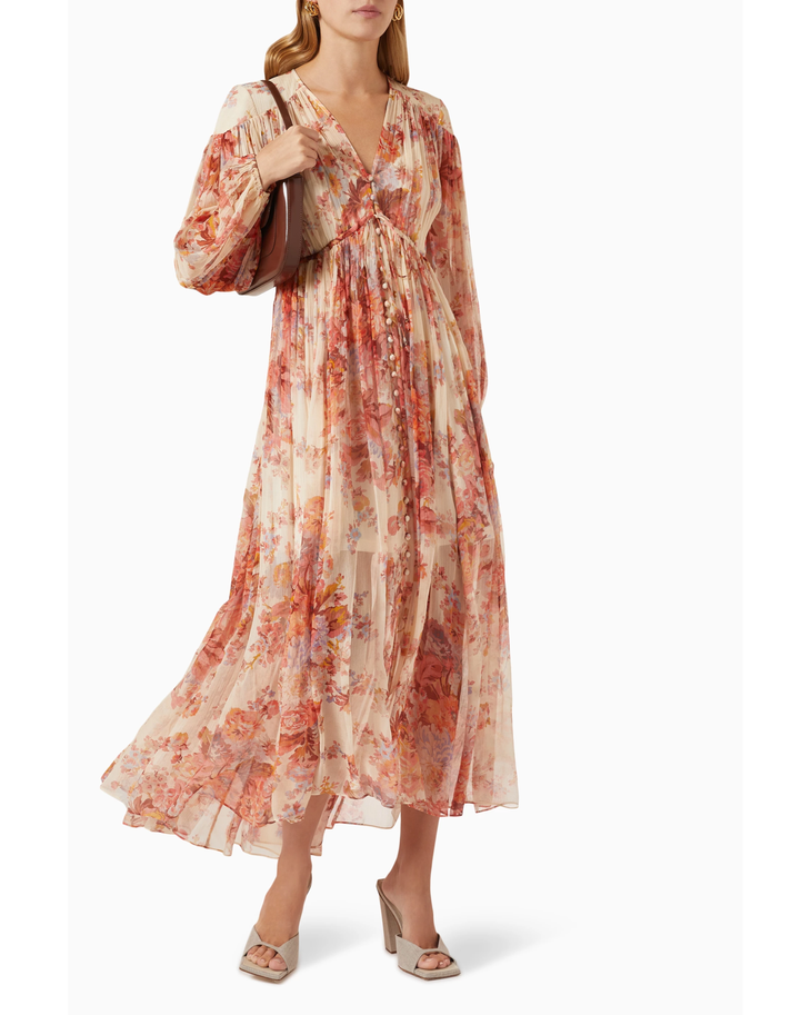 Floral print maxi dress with gathered yoke, V-neckline, billowy sleeves, and flowing tiered skirt in peachy tones — Zimmermann | Endless UAE