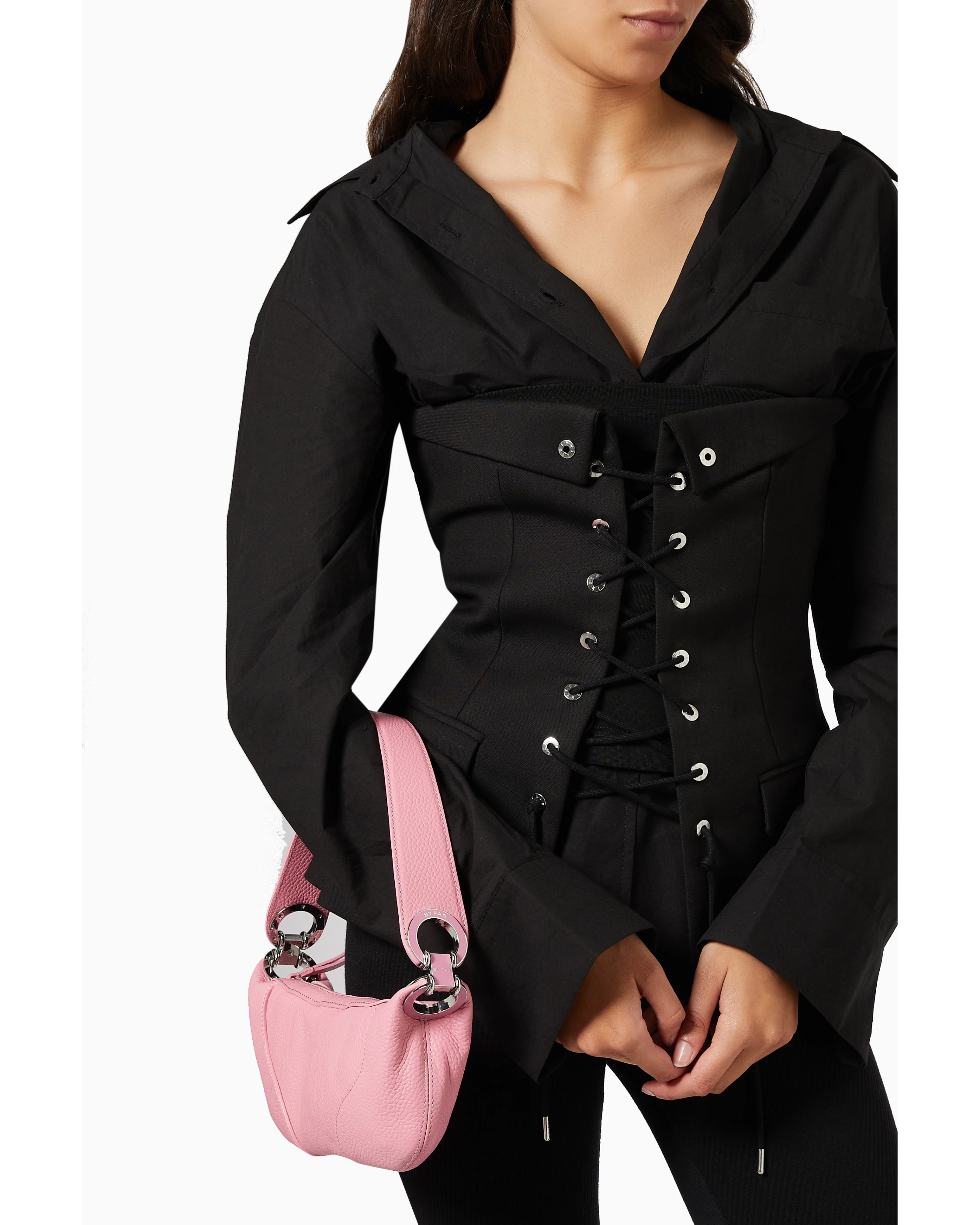 Pink leather mini shoulder bag with dual handles displayed against neutral background — By Far | Endless UAE