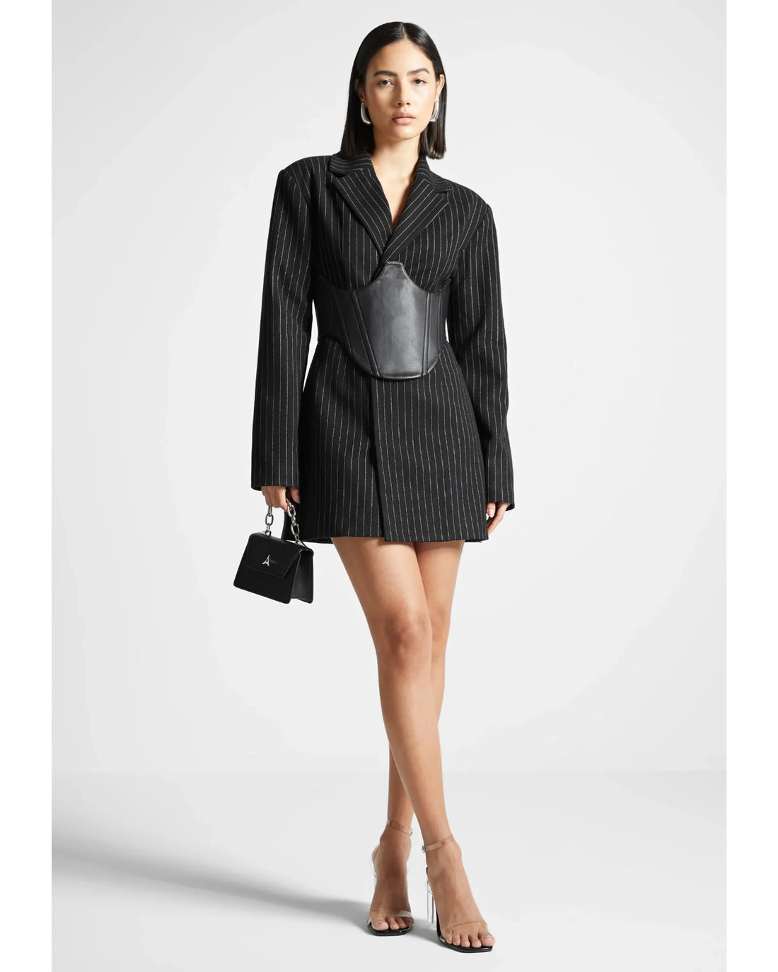 Black pinstripe blazer dress with reversible leather corset belt — Manière De Voir | Endless UAE
