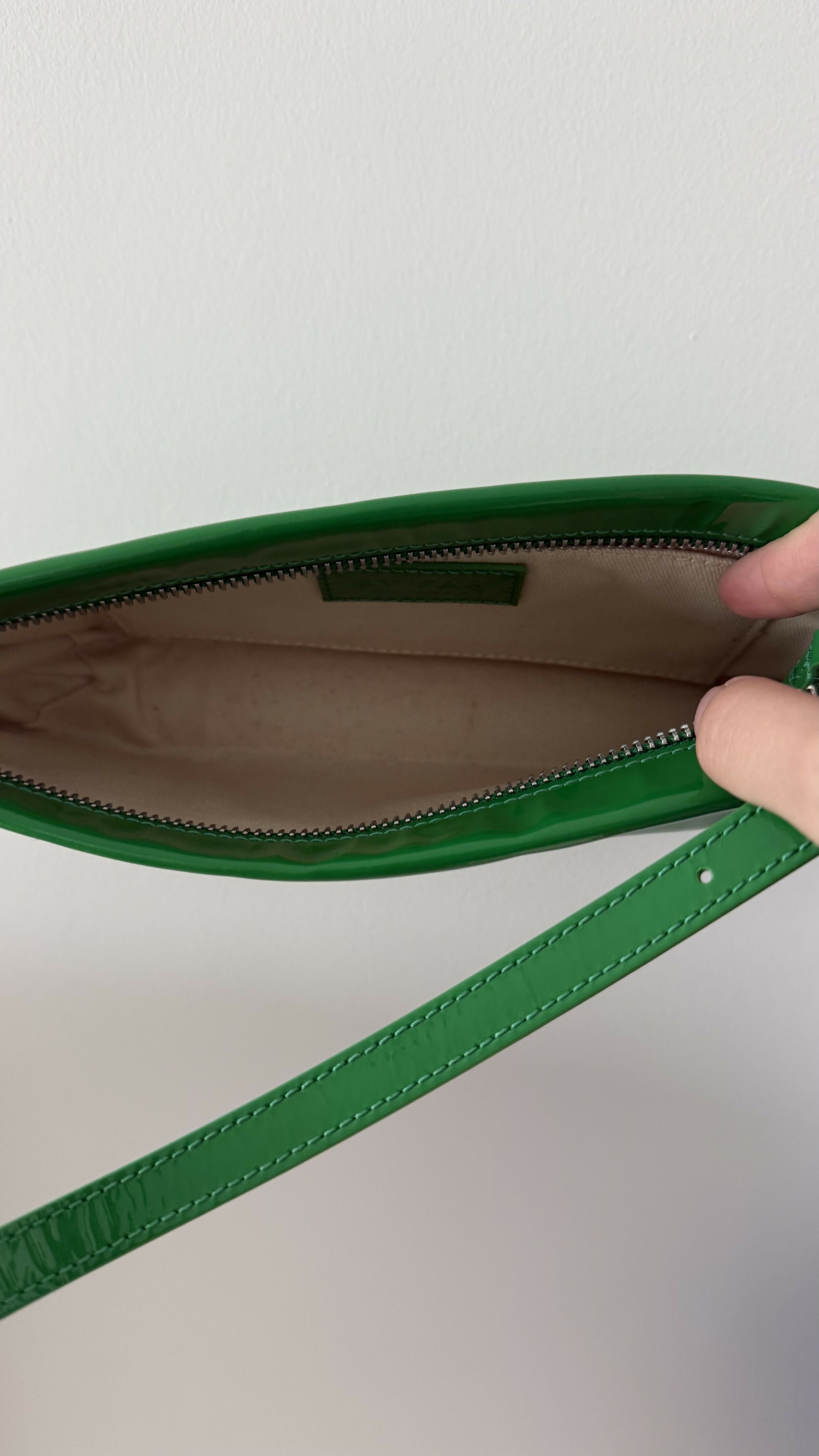 Dulce Patent Leather Shoulder Bag in vibrant green, held up against neutral background — By Far | Endless UAE