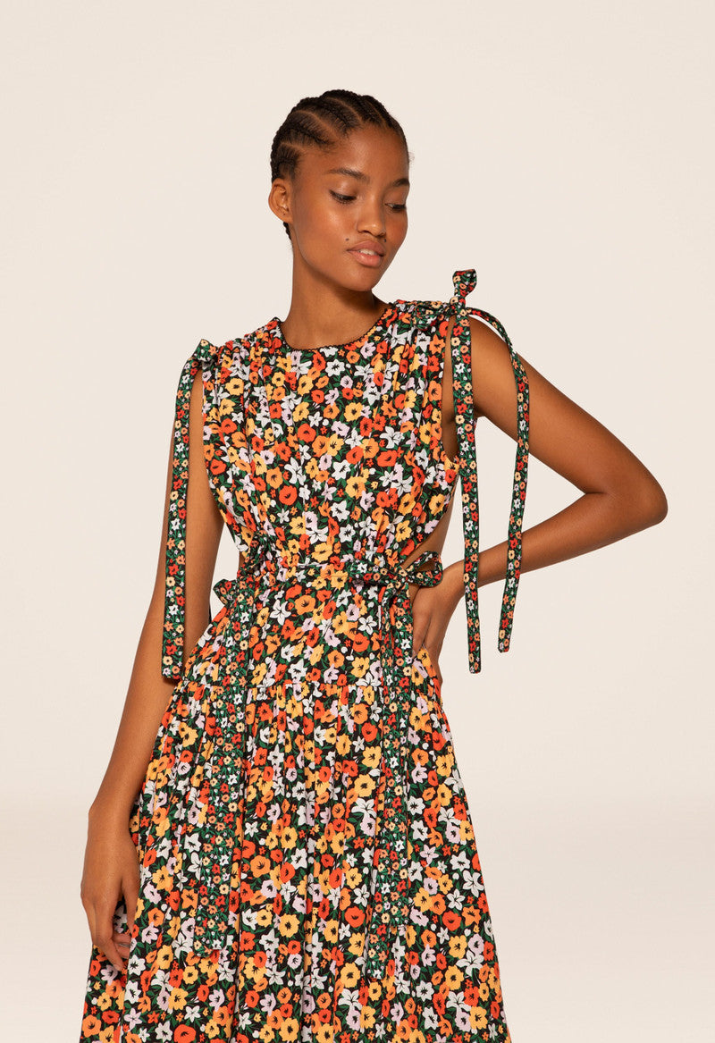 Woman wearing Guaguanco Midi Dress in colorful floral print with 3/4 sleeves — Agua By Agua Bendita | Endless UAE