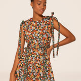 Woman wearing Guaguanco Midi Dress in colorful floral print with 3/4 sleeves — Agua By Agua Bendita | Endless UAE