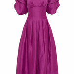 Woman wearing Adelie Puff Sleeve Midi Dress in plum with black strappy sandals — Aje | Endless UAE