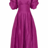 Woman wearing Adelie Puff Sleeve Midi Dress in plum with black strappy sandals — Aje | Endless UAE