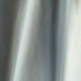 Woman wearing light blue sleeveless midi dress with corset top and full skirt — Endless | Endless UAE