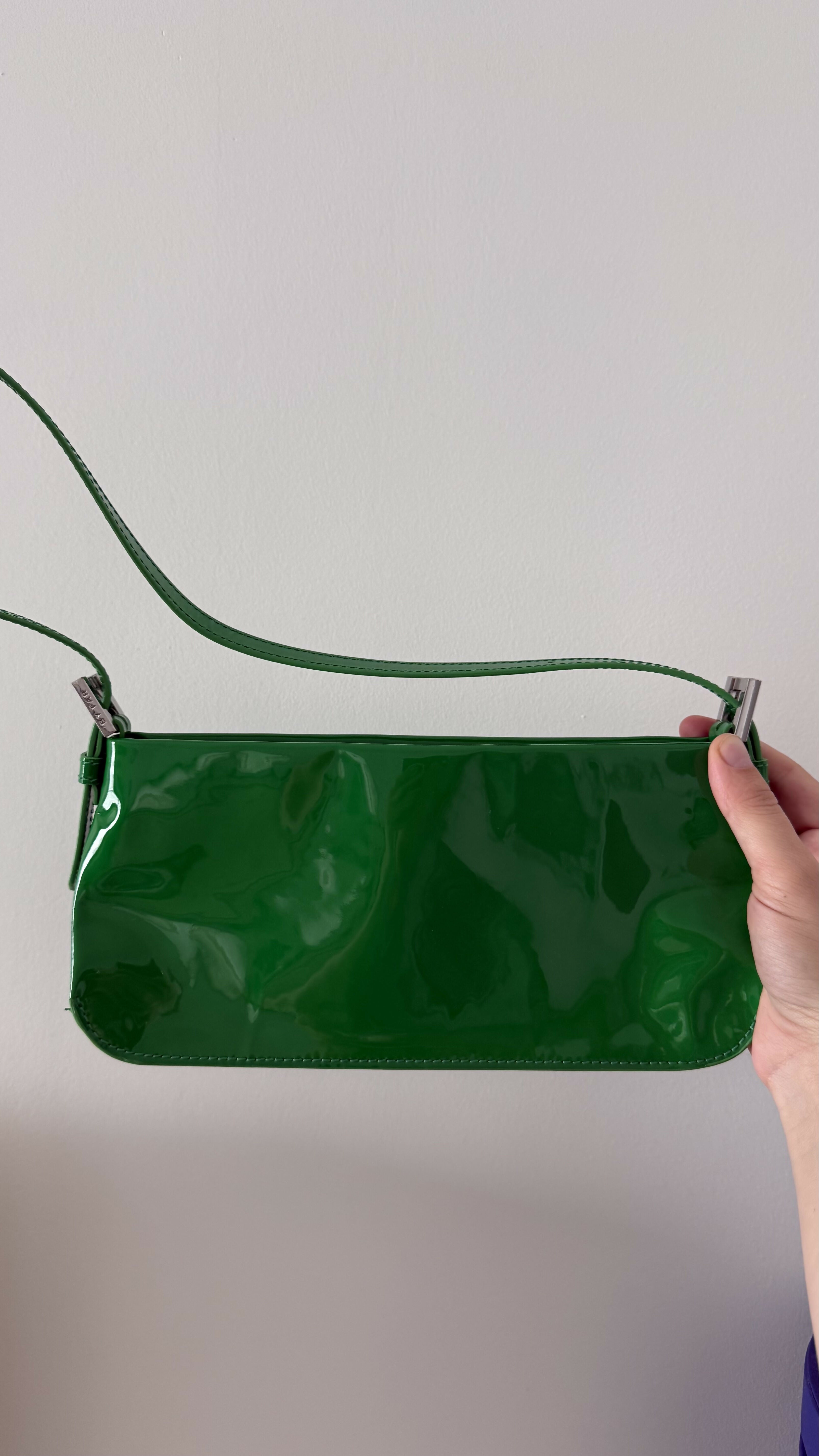 Dulce Patent Leather Shoulder Bag in vibrant green, held up against neutral background — By Far | Endless UAE