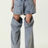 Ashton Cut-out Jeans in light blue denim with strategic knee and thigh cutouts — Attico | Endless UAE