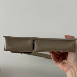 Beige patent leather shoulder bag with dual compartments and silver turnlock closures — Endless | Endless UAE