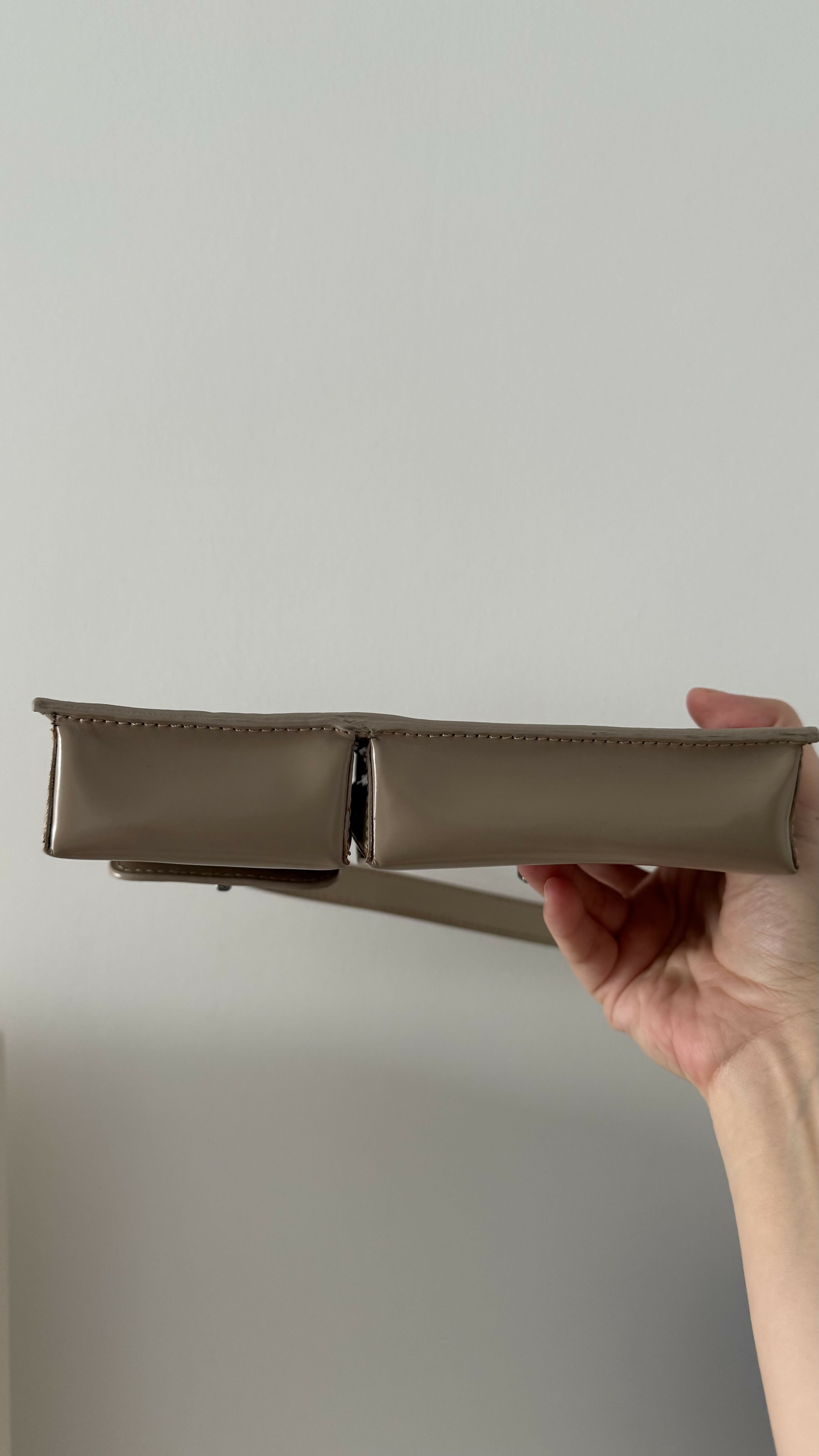 Beige patent leather shoulder bag with dual compartments and silver turnlock closures — Endless | Endless UAE