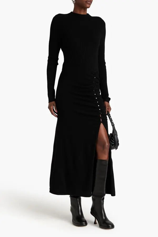 Black ribbed wool-blend midi dress with ruched side detail and long sleeves on model with black boots — Sandro | Endless UAE