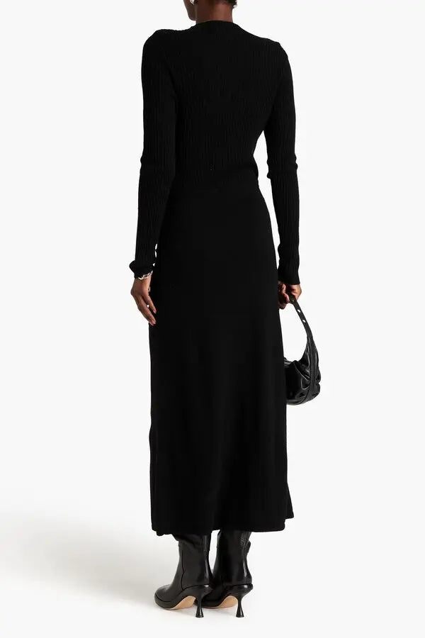 Black ribbed wool-blend midi dress with ruched detailing and long sleeves, back view on model with boots — Sandro | Endless UAE