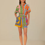 Colorful patchwork romper with mixed floral prints and green trim belt — FARM Rio | Endless UAE