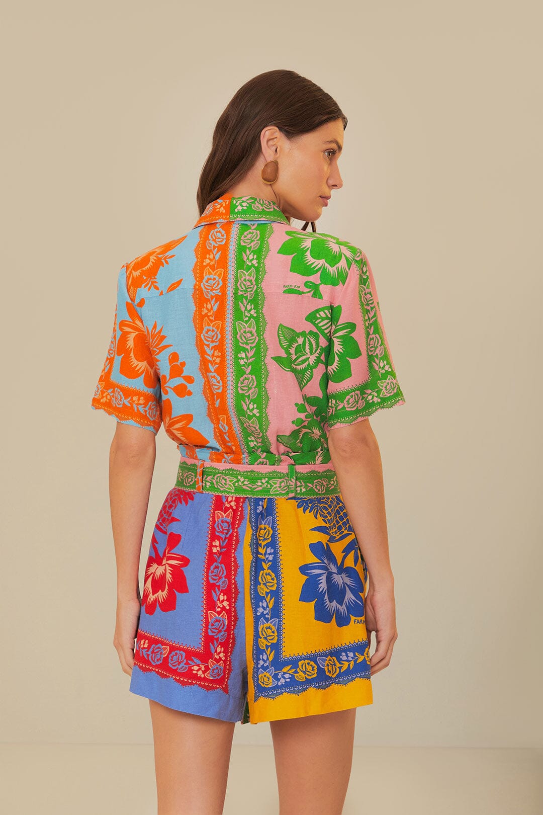 Colorful patchwork romper with mixed floral prints and green trim belt — FARM Rio | Endless UAE
