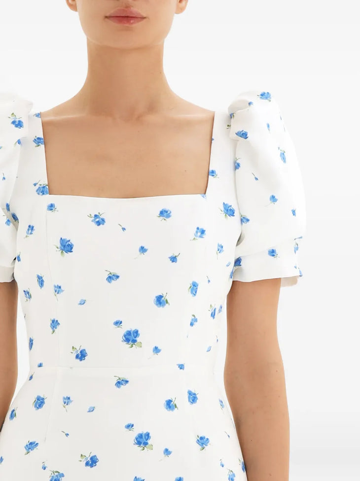 White dress with blue floral print and square neckline, featuring puff sleeves — Post Meridiem | Endless UAE