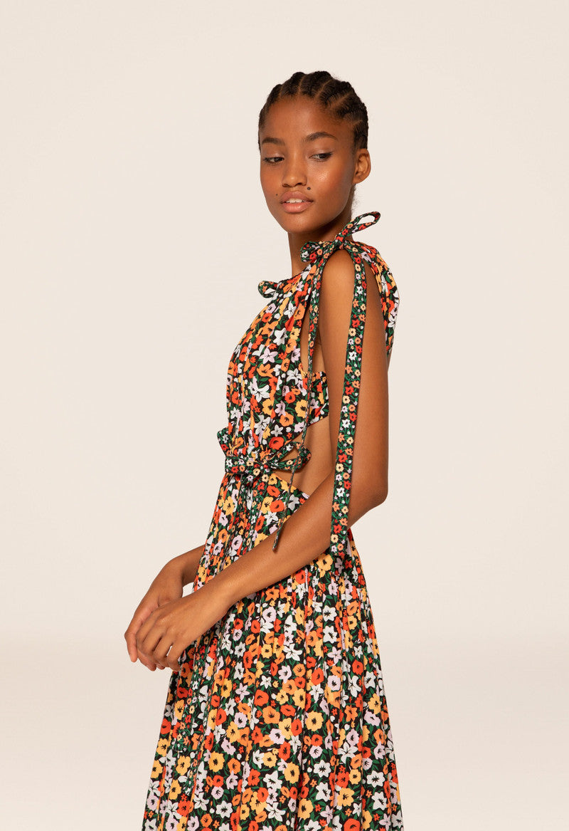 Woman wearing Guaguanco Midi Dress in colorful floral print with 3/4 sleeves — Agua By Agua Bendita | Endless UAE