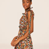 Woman wearing Guaguanco Midi Dress in colorful floral print with 3/4 sleeves — Agua By Agua Bendita | Endless UAE