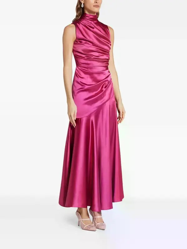 Woman wearing pink draped sleeveless maxi dress with high neckline and ruched detailing — Vasiliki | Endless UAE