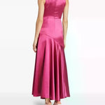 Woman wearing pink draped sleeveless maxi dress with high neckline and ruched detailing — Vasiliki | Endless UAE
