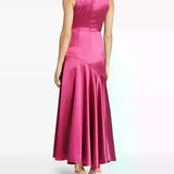 Woman wearing pink draped sleeveless maxi dress with high neckline and ruched detailing — Vasiliki | Endless UAE