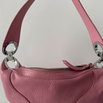 Pink leather mini shoulder bag with dual handles displayed against neutral background — By Far | Endless UAE