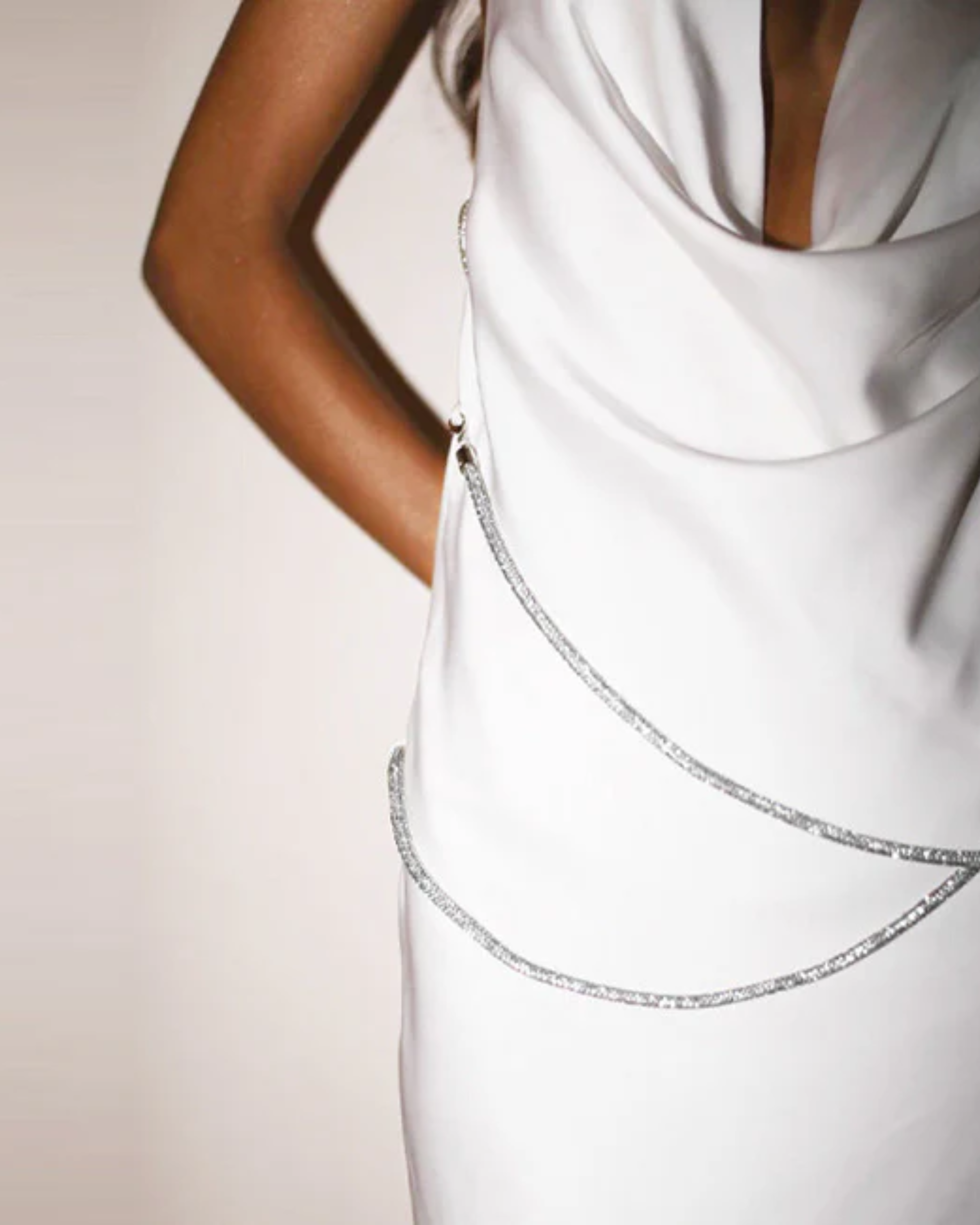 Woman wearing white halter mini dress with purple diamante chain detail — Meshki | Endless UAE