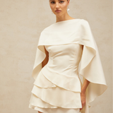 Lyna White Satin Dress with draped cape overlay and tiered skirt — Miss Rosier | Endless UAE