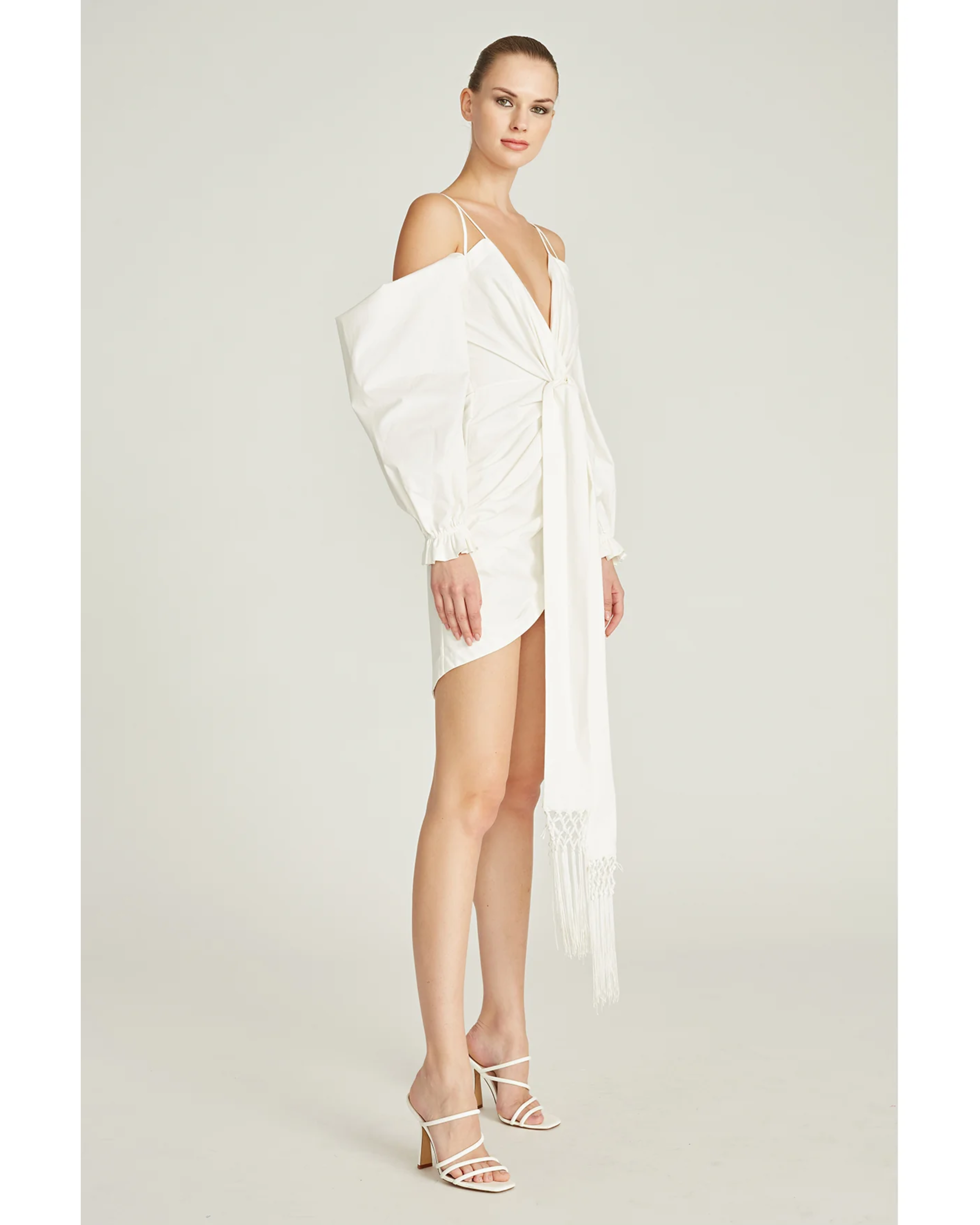 Frida Draped Dress in white with cold-shoulder sleeves and asymmetrical hem — Amur | Endless UAE