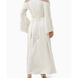 Ivory maxi dress with sheer mesh shoulders, bell sleeves, and braided rope belt tie at waist, shown from back — Nass | Endless UAE