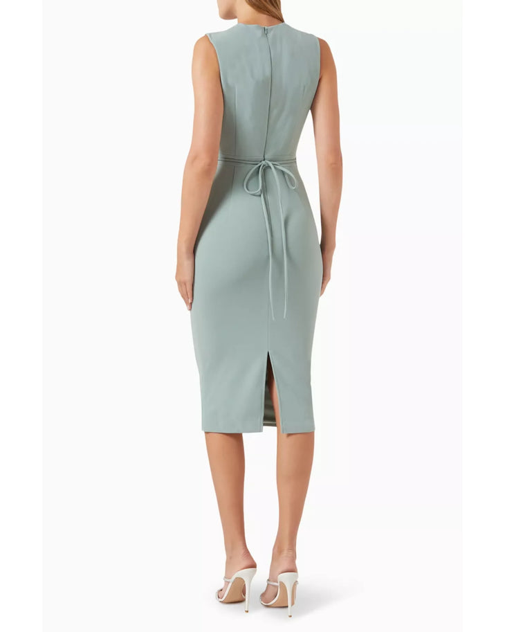 Woman wearing sage green sleeveless cut-out midi dress with white sandals — Elle Zeitoune | Endless UAE