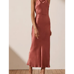 Woman wearing rust-colored high neck bias midi dress with strappy heels — Shona Joy | Endless UAE