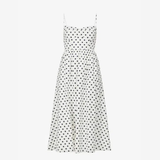 White midi dress with black polka dots, sweetheart neckline, and thin spaghetti straps — Reformation | Endless UAE