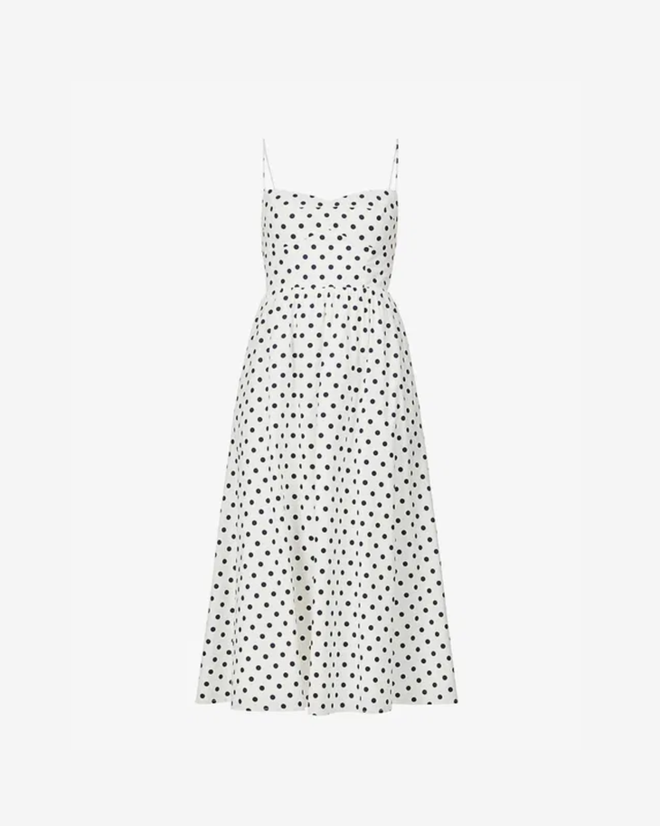 White midi dress with black polka dots, sweetheart neckline, and thin spaghetti straps — Reformation | Endless UAE