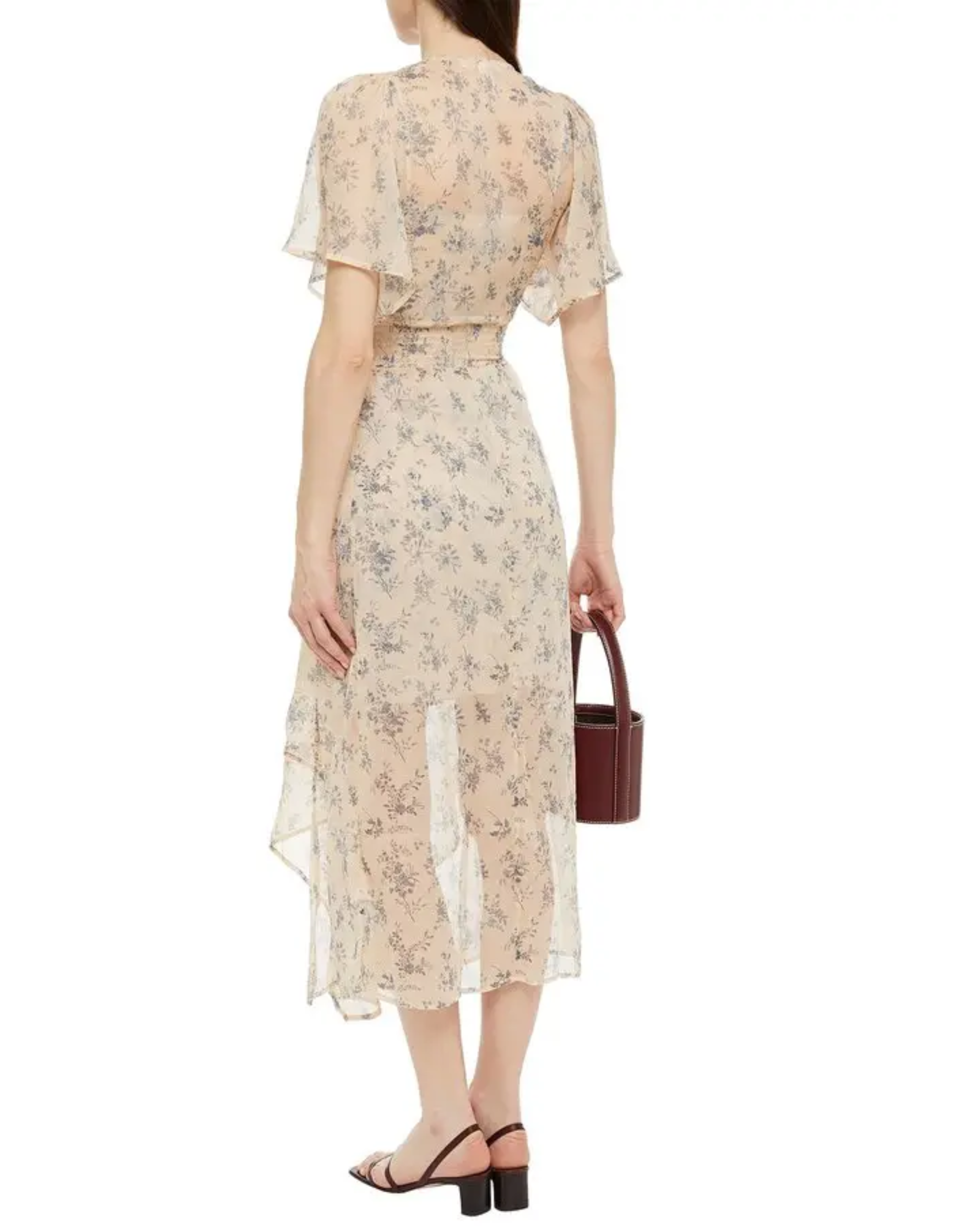 Rear view of woman wearing cream floral-print midi dress with flutter sleeves and shirred waist, holding burgundy handbag — Maje | Endless UAE
