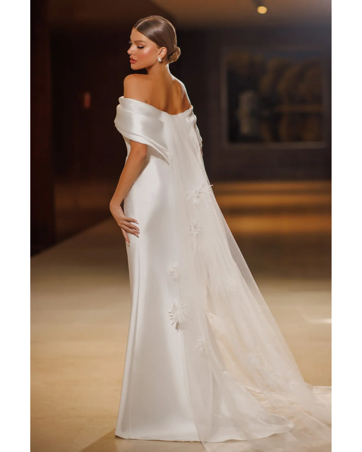 Elegant off-shoulder white satin wedding gown with delicate floral embroidery and train — Mary Trufel Boutique | Endless UAE
