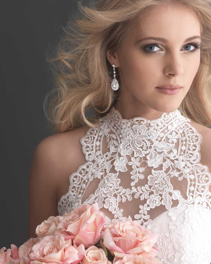 Elegant bridal gown with intricate white lace high neckline and sheer detailing — Allure Romance | Endless UAE