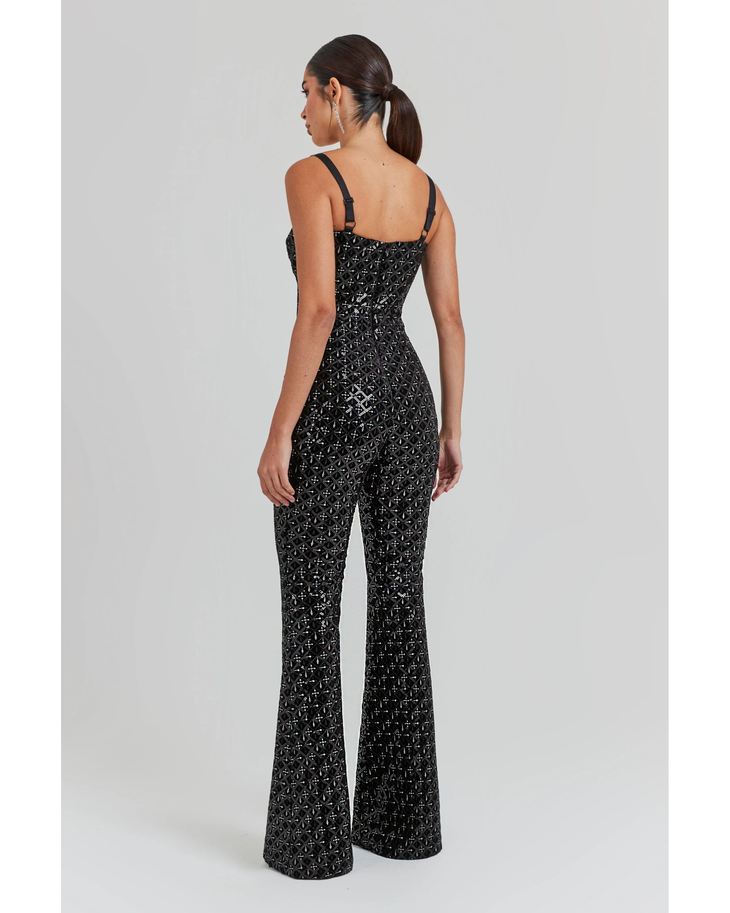 Black sequin jumpsuit with wide-leg pants and strappy back detail, shown from behind — Nadine Merabi | Endless UAE