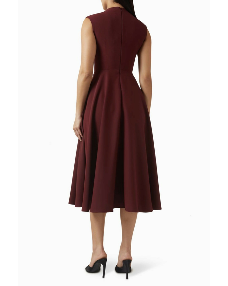 Sleeveless burgundy midi dress with high neckline and flared skirt shown from back — Odd Muse | Endless UAE