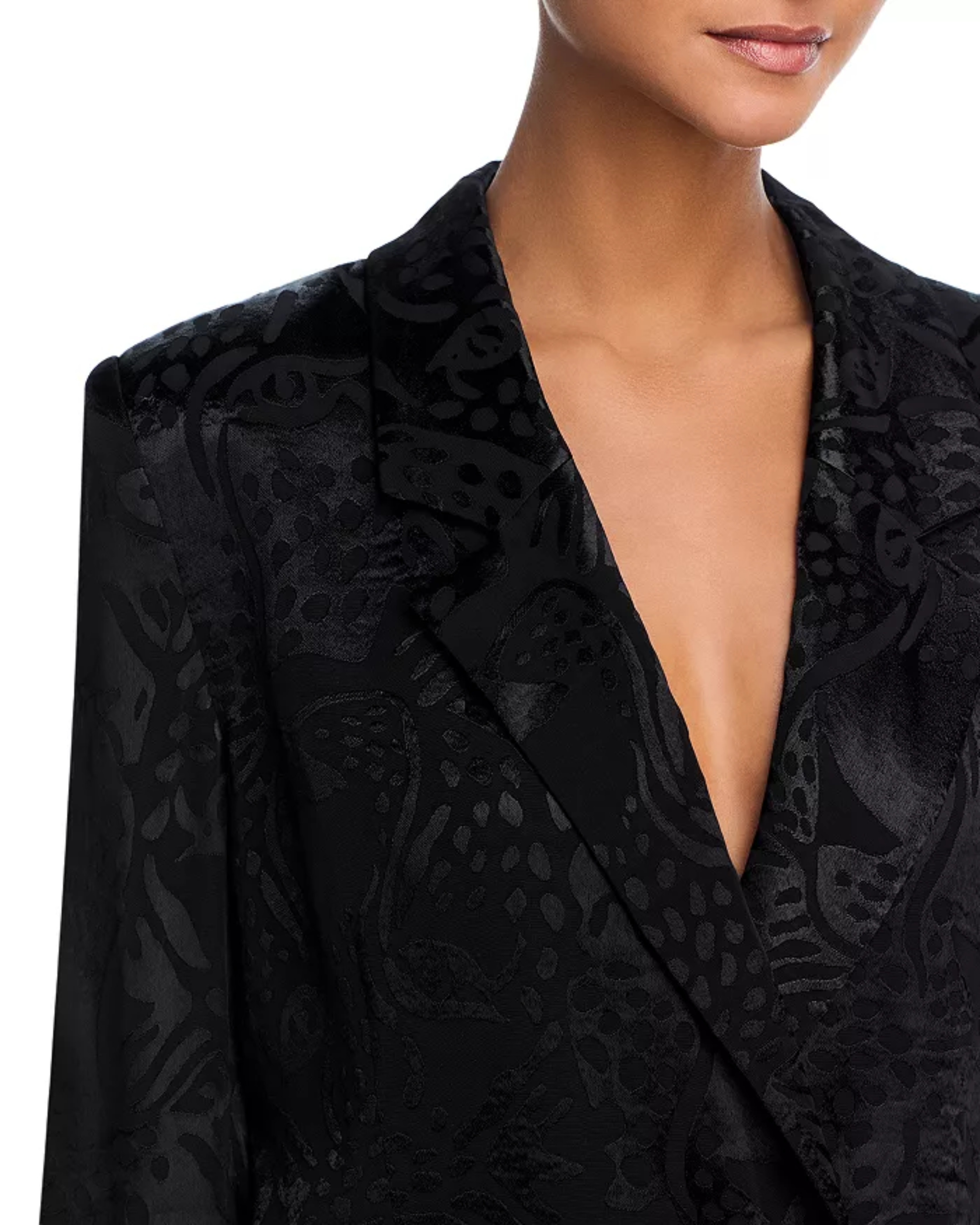 Woman wearing black leopard jacquard blazer and matching wide leg pants with accessories — Farm Rio | Endless UAE
