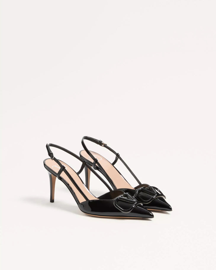 Black patent leather slingback pumps with pointed toe and VLogo hardware detail — Valentino Garavani | Endless UAE