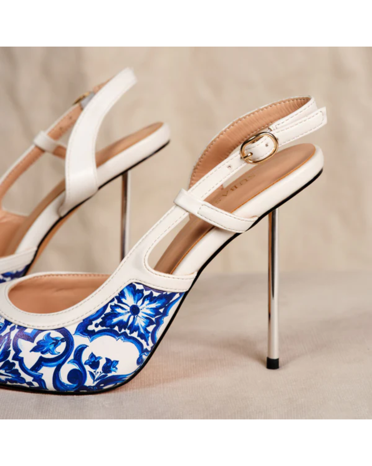 White slingback heels with blue and white porcelain-inspired floral print toe and metallic stiletto heel — Subashini Heels | Endless UAE