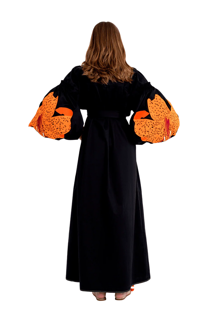 Black cotton caftan with orange embroidered lily sleeves, full-length back view — Yuliya Magdych | Endless UAE