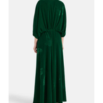 Woman wearing a forest green silk velvet maxi dress with draped sleeves and embroidered details — Themis-Z | Endless UAE