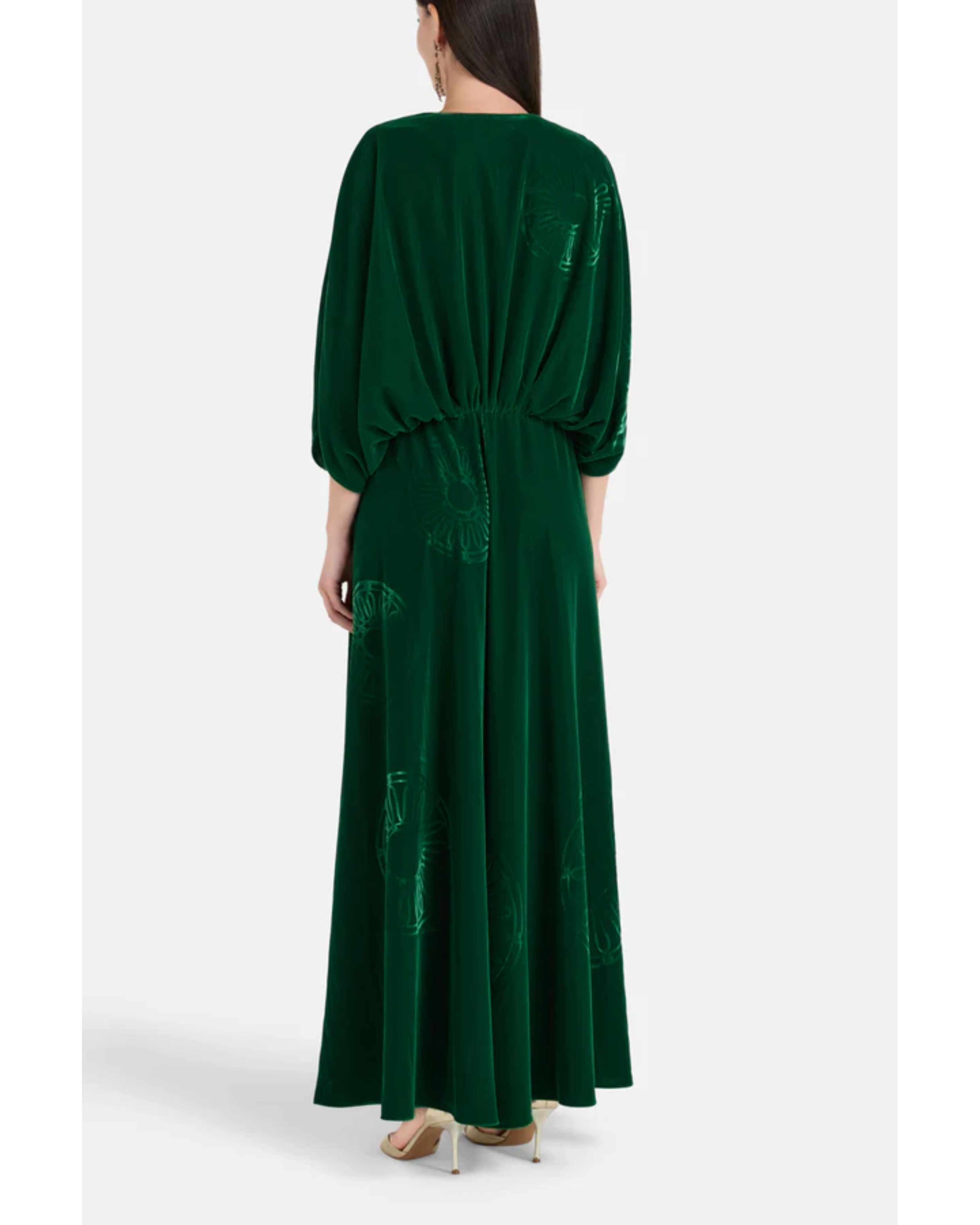 Woman wearing a forest green silk velvet maxi dress with draped sleeves and embroidered details — Themis-Z | Endless UAE