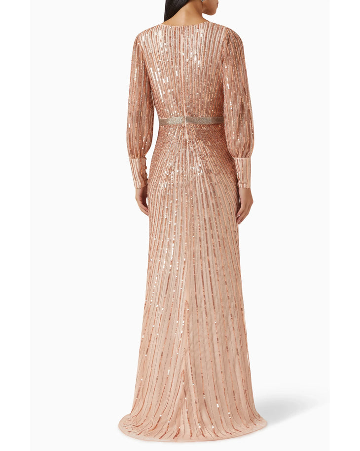 Elegant rose gold sequinned wrap gown with long sleeves and embellished waist belt, full-length silhouette — Mac Duggal | Endless UAE