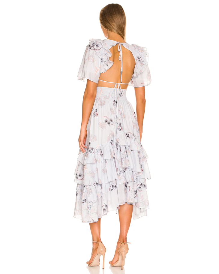 Floral midi dress with open back, puff sleeves, and tiered ruffle skirt in soft lilac — Magali Pascal | Endless UAE