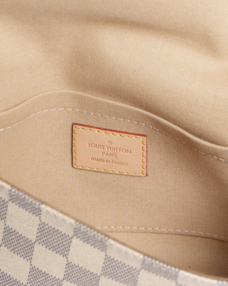 Interior view of Damier Azur canvas crossbody bag showing beige lining and leather Louis Vuitton Paris label — Louis Vuitton | Endless UAE